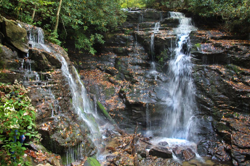 A view of Soco Falls from halfway down to the base